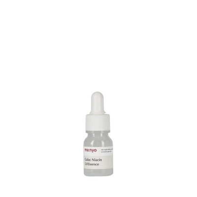 Klar flaske med hvid dråbeprop og etiket: "Manyo Galac Niacin 2.0 Essence".