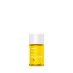 Flaske med gul Manyo Pure Cleansing Oil, 25 ml, hvidt låg og tekst på etiketten.