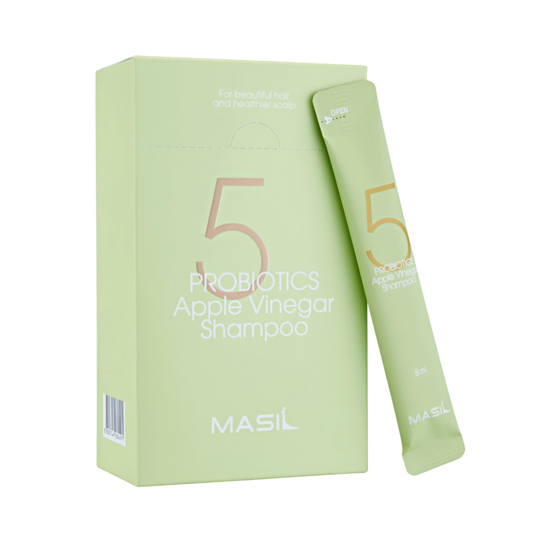 Lys grøn æske og pose med Masil 5 Probiotics Apple Vinegar Shampoo, 8 ml.