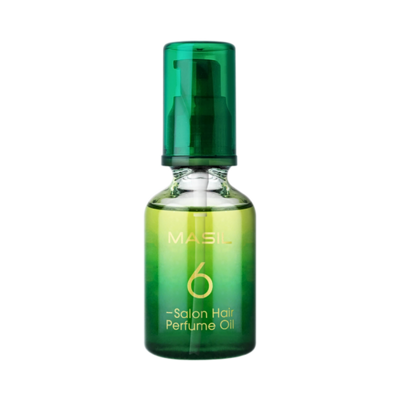 Grøn flaske med pumpe, mærket "Masil 6 Salon Hair Perfume Oil" i guldbogstaver.