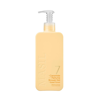 Pastelgul flaske med pumpe, mærket "MASIL 7 Ceramide Perfume Shower Gel - Sweet Flower."