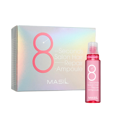 Holografisk æske og pink flaske af Masil 8 Seconds Salon Hair Repair Ampoule med produkttekst.