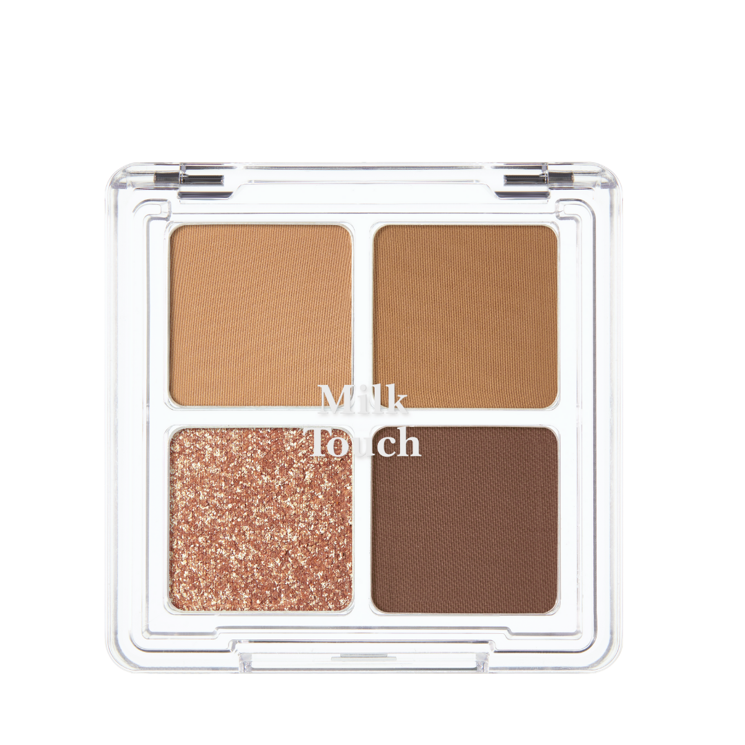 Fire øjenskygger: to matte brune, én glitter kobber, én dyb brun. Klar låg med "Milk Touch".