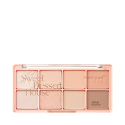 Makeup-palette med ni nuancer i fersken og neutrale toner, mærket "Sweet Dessert House."