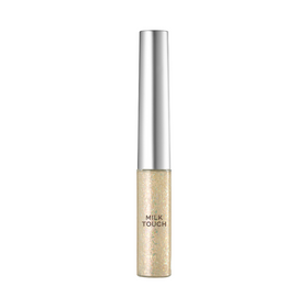 Sølvhætte tube med funklende, lys glitter, mærket "Milk Touch".
