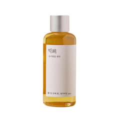 Klar flaske med lysebrun væske, sølvhætte, hvid etiket med koreansk tekst. 100 ml.
