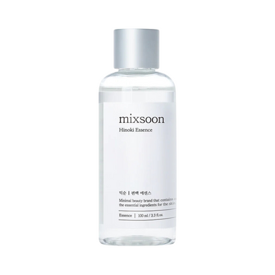 Klar flaske med sølvhætte, mærket "mixsoon Hinoki Essence", minimalistisk design, 100 ml.