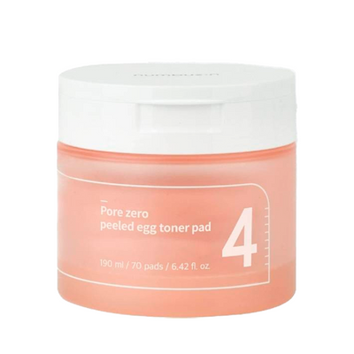 Orange krukke med hvidt låg, teksten "Pore Zero Peeled Egg Toner Pad" og tallet "4" på etiketten.