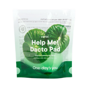 Grøn emballage med teksten "Help Me! Dacto Pad" og bladdesign. Produktnavn står tydeligt.