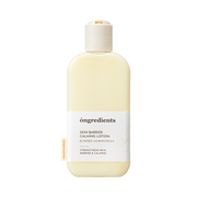 Cremefarvet flaske med hvid etiket, "Ongredients Skin Barrier Calming Lotion" påtrykt.