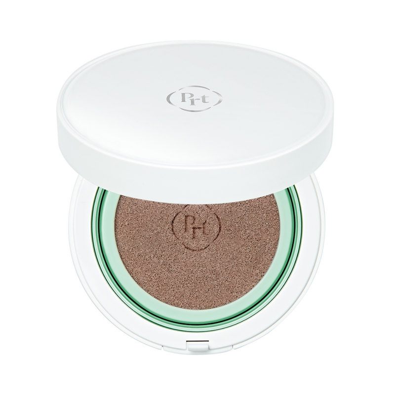Hvid kompakt med beige BB-pude fra Purito. Logo på låget.