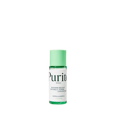 Klar flaske med grøn hætte, mærket "Purito SEOUL Wonder Releaf Centella Toner Unscented".