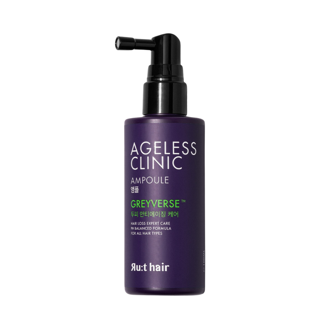 Lilla flaske med pumpe, mærket "AGELESS CLINIC AMPOULE", til hårpleje.