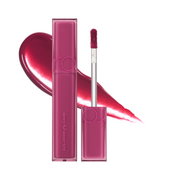 Pink lip tint med applikator, baggrund af bærfarvet gloss.