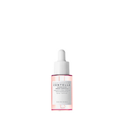 Klar flaske med hvid etiket og dråber, SKIN1004 Centella Poremizing Ampoule, 30 ml.