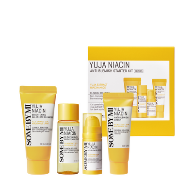 Skincare sæt med gul og hvid emballage, herunder cremer og serummer fra Some By Mi Yuja Niacin.