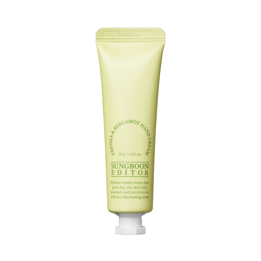 Lys grøn tube håndcreme, "Sungboon Editor - Freesia & Bergamot" står med grøn tekst.