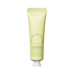 Lys grøn tube håndcreme, "Sungboon Editor - Freesia & Bergamot" står med grøn tekst.
