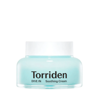 Lys blå krukke med hvidt låg. Tekst: Torriden DIVE IN Soothing Cream.