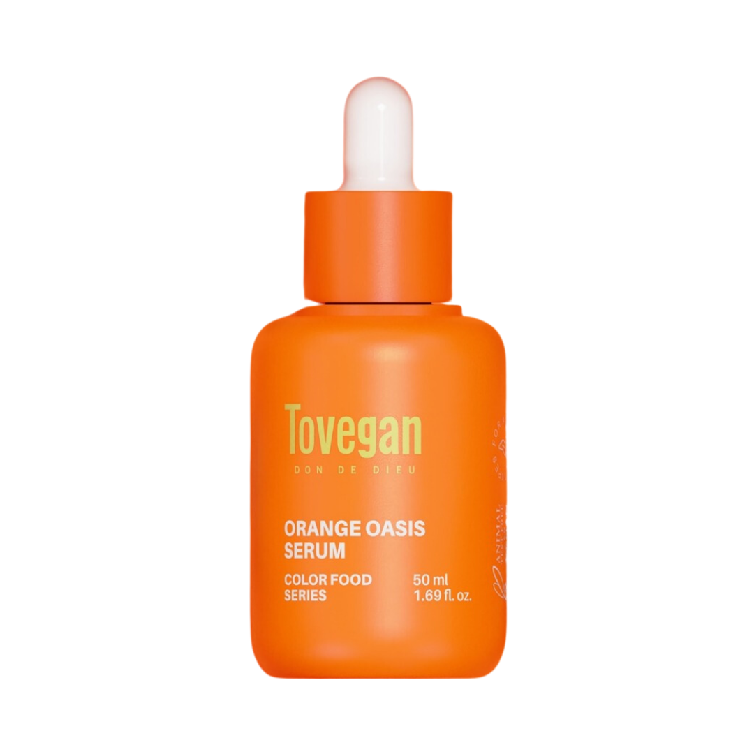 Orange dropperflaske med teksten "Tovegan Orange Oasis Serum, 50 ml, Color Food Series".