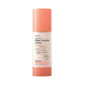 Orange flaske med Hanskin Vitamin C Glow Capsule Lotion, 80 ml.