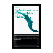 Sort pakke med grøn væske splash og tekst: "Abib Gummy Sheet Mask Madecassoside Sticker".