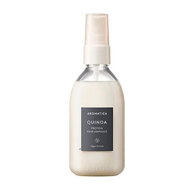 Flaske med Aromatica Quinoa Protein Hair Ampoule, hvid pumpe, grå etiket med produktnavn.