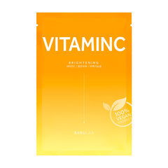 Gult-orange maskeemballage med "Vitamin C", "Brightening" og "100% vegansk produkt" segl.