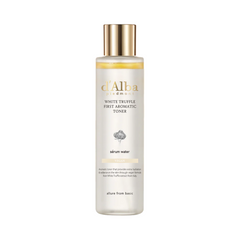 d'Alba White Truffle First Aromatic Toner i klar flaske med guldlåg og elegant skrift.