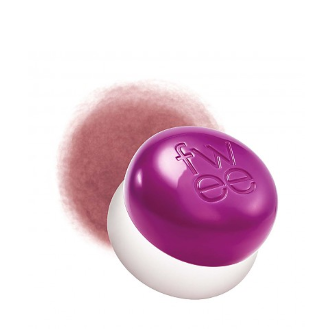 Lilla låg med "fwee" indgraveret, hvid base, sløret pink baggrund.