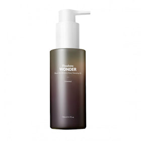 Flaske med pumpe, mørk farve, hvid tekst: "Haruharu Wonder Black Rice Deep Cleansing Oil", 150 ml.