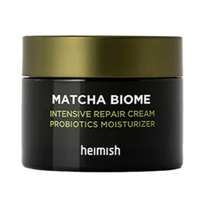 Grøn låg, sort krukke med teksten "Matcha Biome Intense Repair Cream" og "Heimish."