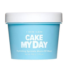 Blå beholder med teksten "I Dew Care - Cake My Day", en fugtgivende maske, 100 g.