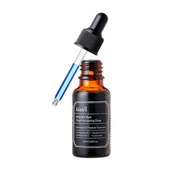 Brun glasflaske med sort etiket, dropper indeholder blå væske, produktnavn "Klairs Midnight Blue."