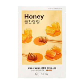 Missha Airy Fit Sheet Mask med honningtema, viser honningkager og honningske.