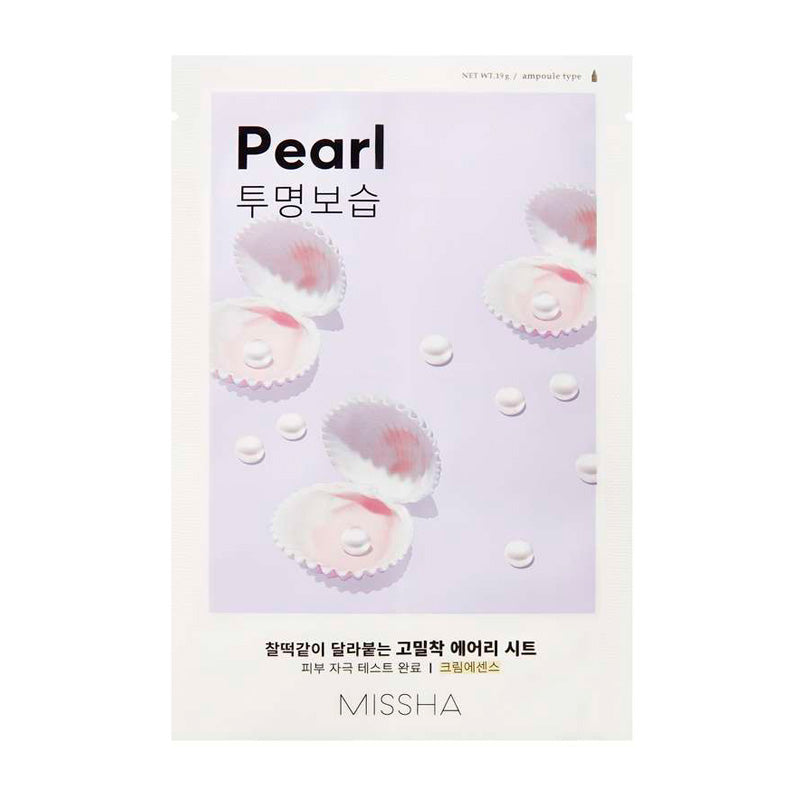 Pakke med "Pearl" tekst, åbne østersskaller med perler, koreansk skrift, Missha-logo.