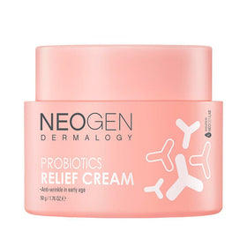 Lyserød krukke med teksten "Neogen Probiotics Relief Cream" og hvide abstrakte former.