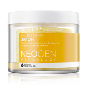 Rund, gennemsigtig beholder med hvide låg og gule gaze pads. Etiket: Neogen Bio-Peel Gauze Peeling Lemon.