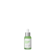 Grøn flaske med hvid etiket, tekst: "Green Tomato Pore Lifting Ampoule+".