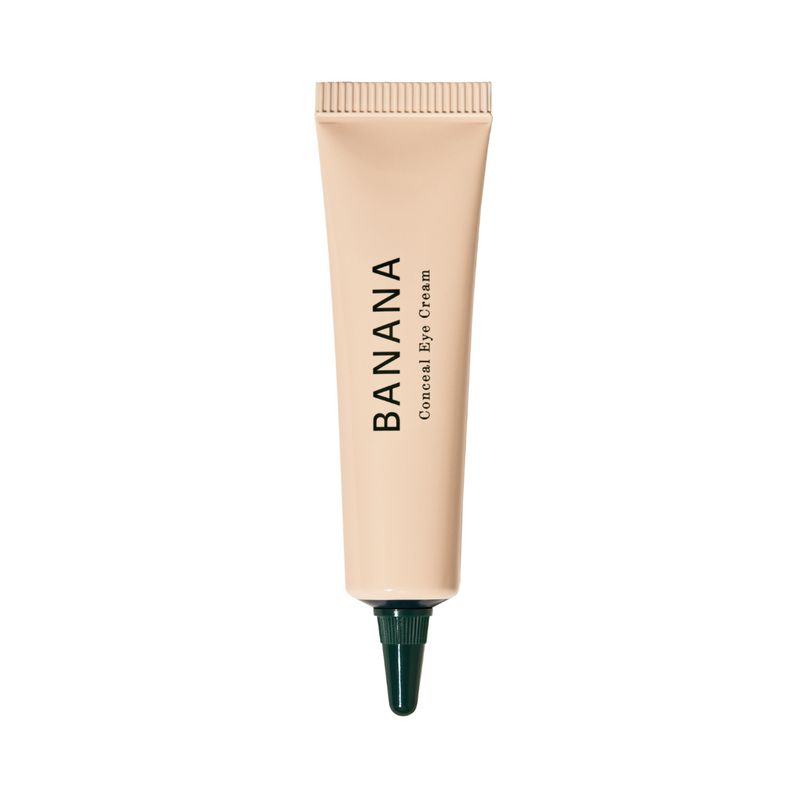 Beige tube med skruelåg, mærket "BANANA Conceal Eye Cream".