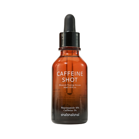 Brun glasflaske med sort pipette, mærket "Caffeine Shot Blemish Toning Serum".