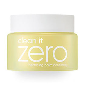 Gul krukke med hvidt låg, mærket "clean it zero cleansing balm nourishing" i hvid skrift.